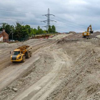 (101) ADT descending the slope under the Ellesborough Road diversion - Aug. 2024 (22_125)